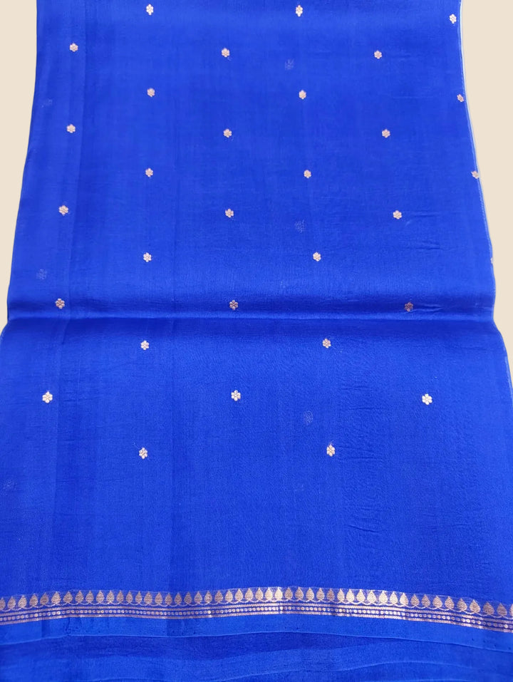 Blue fabric with white dot pattern and border