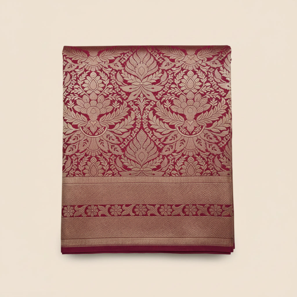 Decorative fabric with red and gold patterns on a white background
