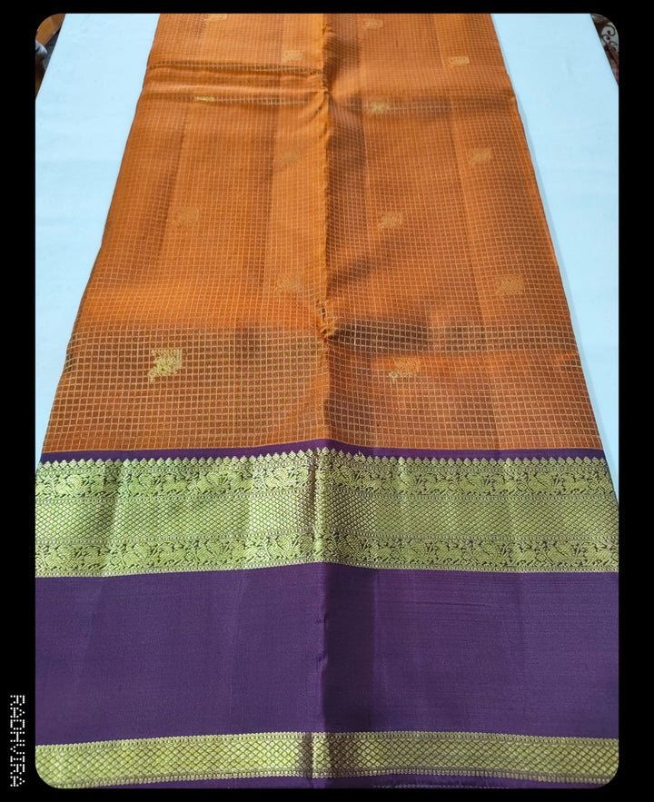 Rust Orange Pure Kanchipuram Silk Saree with Plum Border