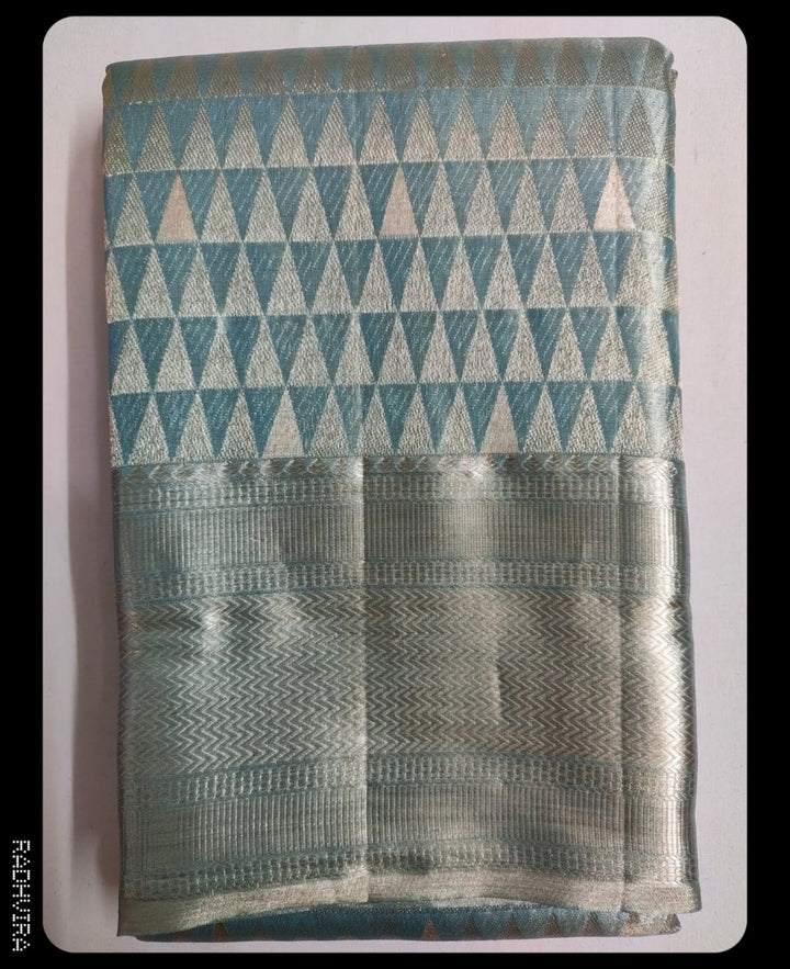 Folded fabric with geometric pattern on a white background