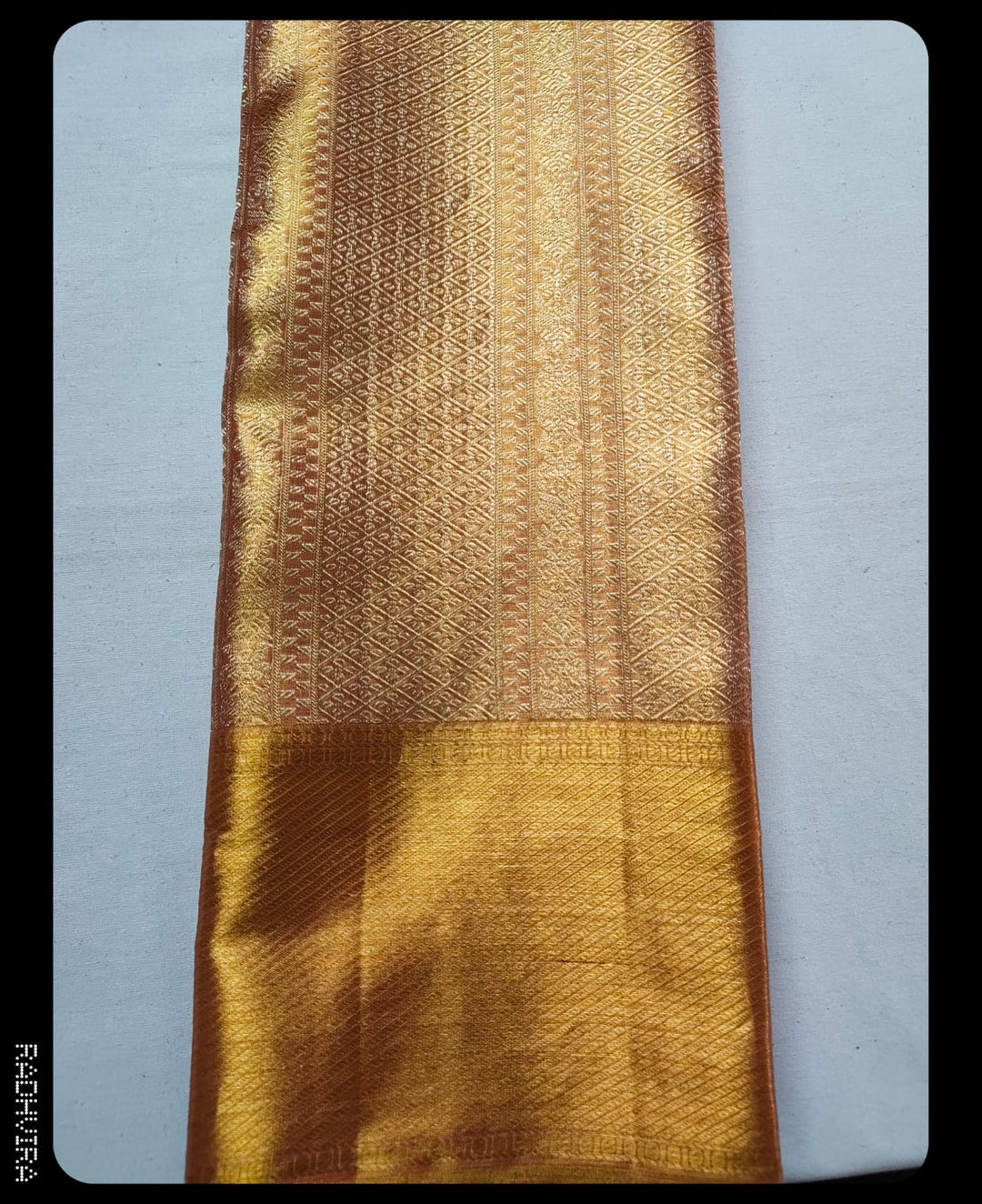 Shimmering Orange Gold Kanchipuram Tissue Silk Saree