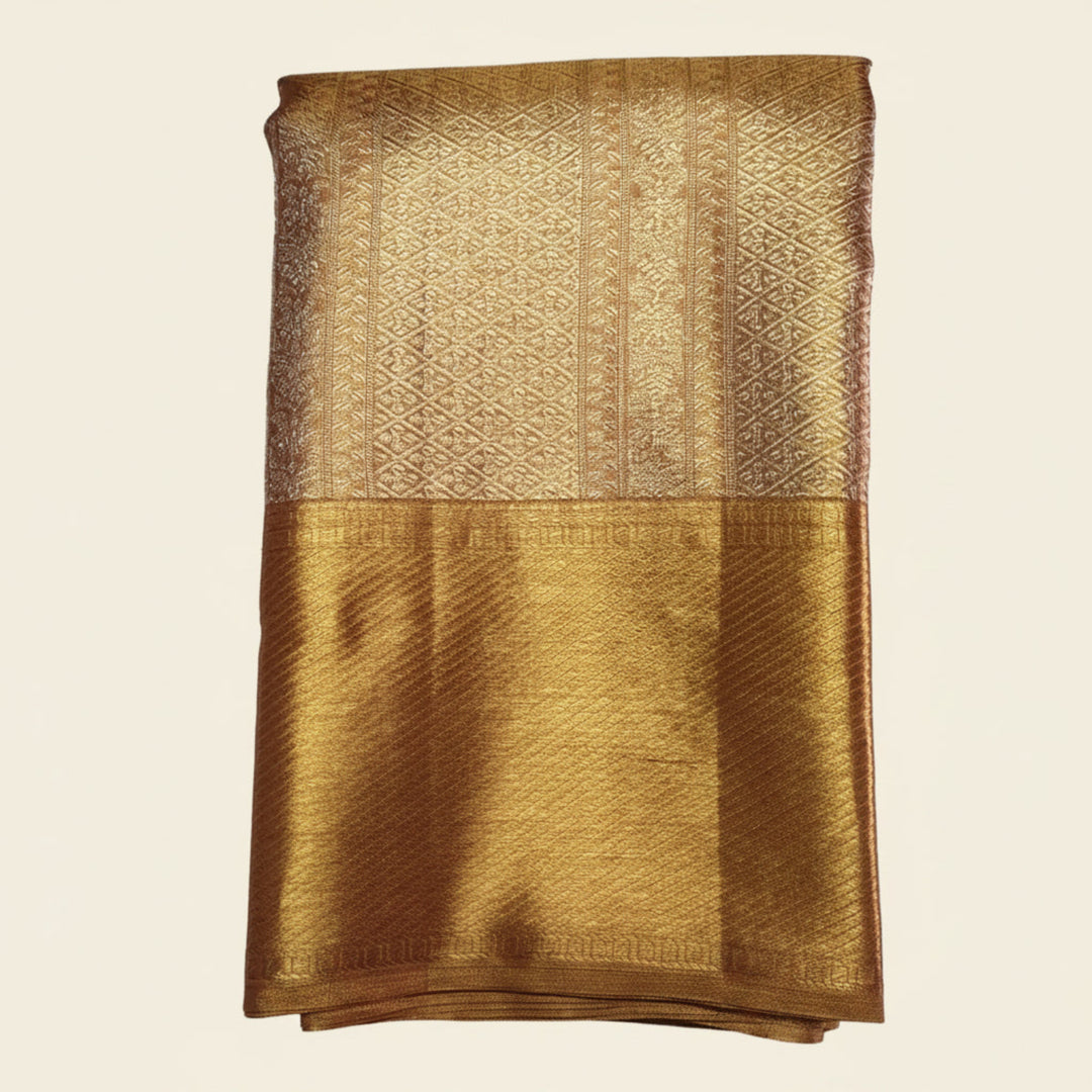 Gold fabric with intricate patterns on a white background